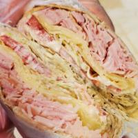 Stewart Avenue Slam Sandwich · Turkey, ham, provolone, pepper jack cheese, lettuce, tomatoes, and mayo.