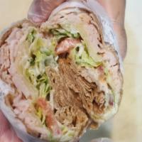 Turkey Temptation Wrap · Turkey, lettuce, tomatoes, Swiss cheese, and ranch dressing.