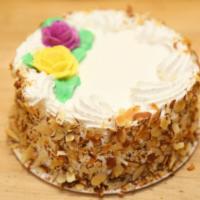 Rum Cake · Sponge cake soaked in rum flavoring, cut into 3 layers in between a layer of chocolate custa...