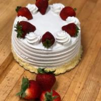 Strawberry Shortcake · American Cake (yellow), cut into 3 layers in between 2 layers of whipped cream and strawberr...