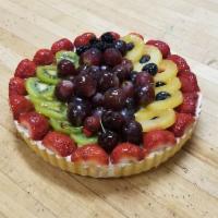 California Fruit Tart · Tart filled with bavarian fluff topped with an assortment of fresh fruit.  **NOTE - Fruit wi...