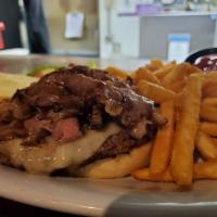 Farmer Browns Prime Rib Burger · Fresh Beef Patty topped with swiss cheese, sauteed onions, & farmer browns signature prime r...