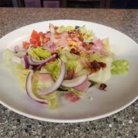 Hook -N- Ladder · Mixed greens, ham, bacon, cheddar cheese, red onion, cucumber, tomatoes, & croutons. Served ...