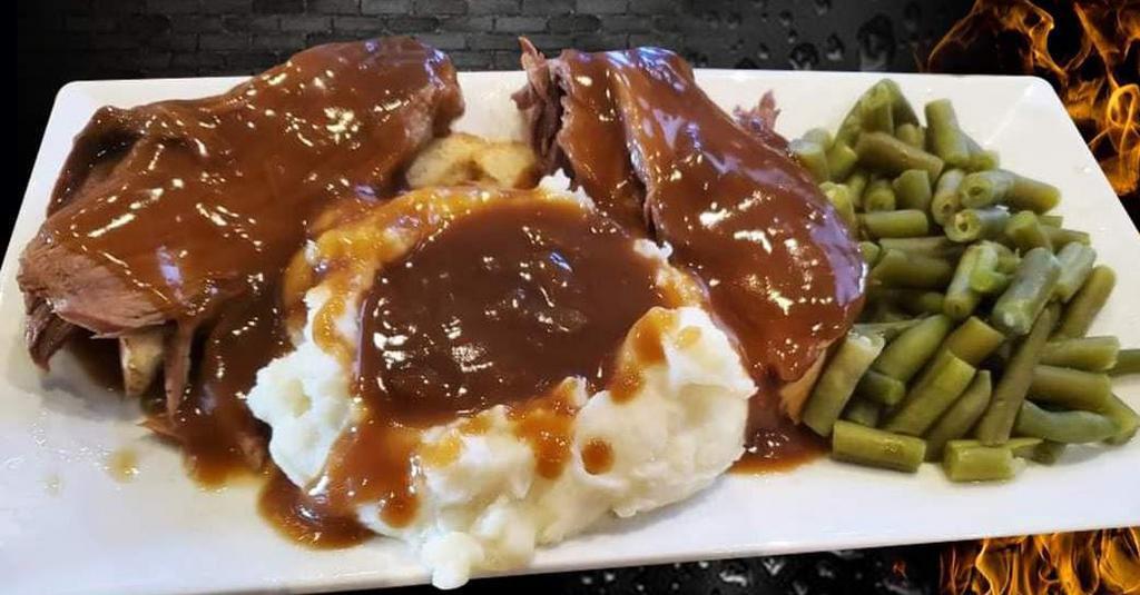 Hot Beef Fridays!! · Tender and flavorful hot beef smothered in brown gravy. Served with Mashed potatoes, brown gravy and green beans. 