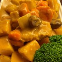 Malayslian Curry Stew · Mild spicy yellow curry. Coconut milk, chicken, potato, carrot, broccoli, onion, pineapple, ...