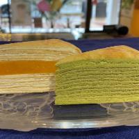 Crepe Cake · Layers of crepe with cream flavored cream filling.