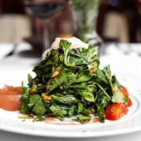 Insalata di Spinaci · Baby spinach, walnuts, pears in a balsamic dressing topped with crumbled blue cheese.