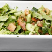 House Salad · Gluten free, Vegetarian. Lettuce, tomato, cucumber, onions, fresh lemon and virgin olive oil.