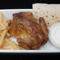 Rotisserie Chicken · Served with fries, garlic sauce and fresh bread