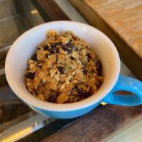 House-made Yogurt and Granola · A bowl of our house-made yogurt and house-made granola made with oats, almonds, walnuts, pum...