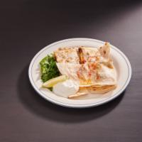 Quesadilla · Comes with , salsa, sour cream, shredded cheese and lettuce.