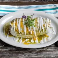 Burrito · Flour tortilla with a savory filling. Topped with salsa verde. Steak, al pastor or carnitas. 