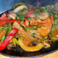 Fajita · Sauteed peppers, tomatoes, onion, served with tortillas. Chicken, steak, shrimp, mixta: chic...