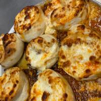 6 Buffalo Chicken Pinwheels · Freshly baked pizza dough smothered with mozzarella cheese, breaded chicken breast, hot sauc...