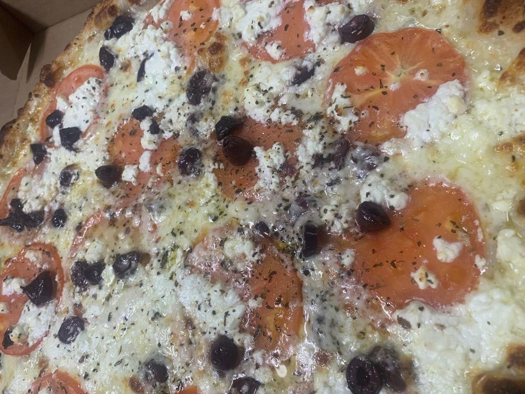 16” Greek Pizza  · Our White Pizza - Topped with Mozzarella cheese, freshly sliced tomatoes, feta cheese, and Kalamata olives.