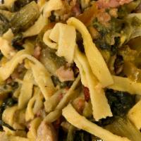 Utica Greens Fettuccine w/sausage · Utica greens with sausage, prosciutto, cherry peppers, breadcrumbs over our homemade fettucc...