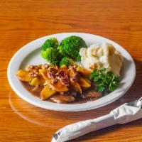 Pork Normandy · Pork Normandy with Apple brandy sauce, served with mashed potatoes and veggies.