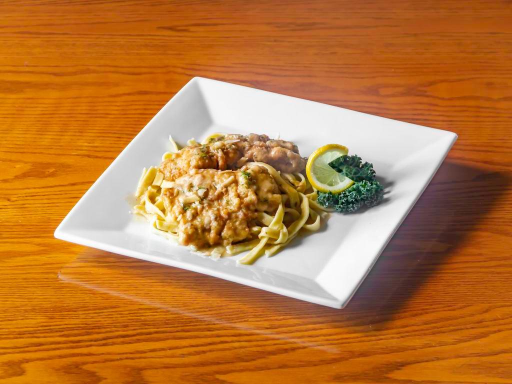 Chicken Francaise · Egg battered and sautéed chicken breast in a lemon wine - garlic sauce over house made fettuccine.