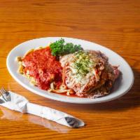 Eggplant Parm · Breaded and fried eggplant baked in our homemade marinara with mozzarella. Served with house...