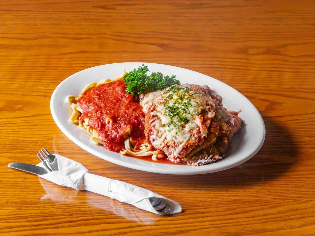 Eggplant Parm · Breaded and fried eggplant baked in our homemade marinara with mozzarella. Served with house made spaghetti.