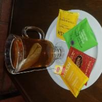 Tea · Manzanilla, lipto,ginger lemon, manzanay canela