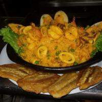 Paella De Mariscos · Seafood paella. Served with 1 sides and salad.