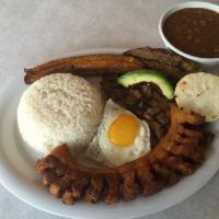 Bandeja Paisa, molida · Ground beef , rice, beans, sweet plantains, corn cake, fried egg, fried pork and avocado.