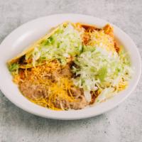 #5. Shredded Beef Taco and Cheese Enchilada Combo Plate · Shredded beef taco with lettuce and cheese and a cheese enchilada.