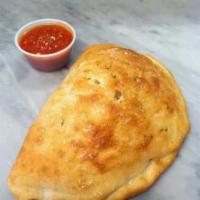 Cheese Calzone · Fresh pizza dough stuffed with mozzarella and ricotta cheeses. Additional toppings for an ex...