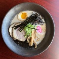 Tonkotsu Ramen Bowl · Thin noodles in our special rich, milky, chicken and pork bone broth topped with braised por...