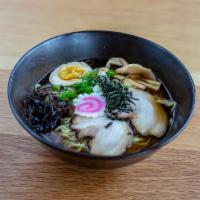 Shoyu Ramen Bowl · Wavy noodles in our special shoyu broth topped with braised pork belly, scallions, bamboo sh...