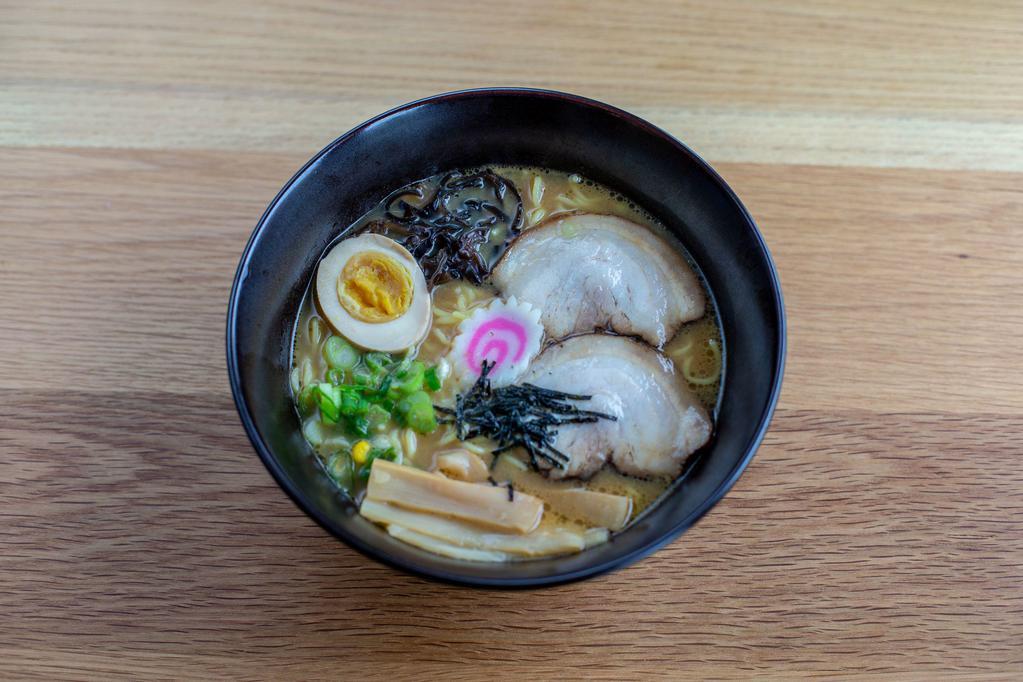 Miso Ramen Bowl · Wavy noodles in our special miso broth topped with braised pork belly, scallions, bamboo shoots, corn, nori, fish cake and half boiled egg.