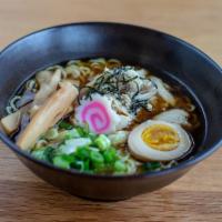 Chicken Shoyu Ramen Bowl · Wavy noodles in our special shoyu broth topped with steamed chicken, scallions, bamboo shoot...