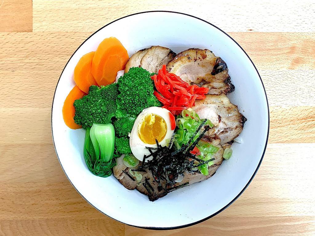 Pork Chashu Rice Bowl · Braised pork belly, scallion, half boiled egg pickled ginger and sesame seeds nori over white rice.