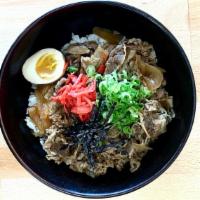 Beef Gyudon Rice Bowl · Simmered thinly sliced beef and onion in special soy sauce, ginger and scallion and boiled e...