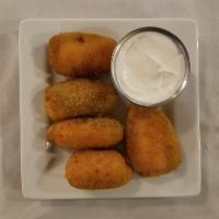 Jalapeno Popper with Jalapeno Ranch Dinner · Jalapeno halves stuffed with mild cheddar cheese, then breaded and fried served with ranch d...