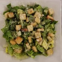 Caesar Salad Dinner · Garden fresh romaine lettuce tossed with Caesar dressing croutons and Parmesan cheese.