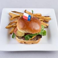 The Texan Burger Dinner · Fresh 8 oz. homemade burger patty, cooked to your temperature, topped with cheese, lettuce, ...