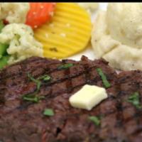 12oz Ribeye Steak · Premium Angus Ribeye Steak cooked to perfection over open grill, served with mash potatoes, ...