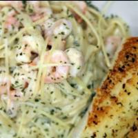 Shrimp Fettuccine Alfredo · Premium Angus Ribeye Steak cooked to perfection over open grill, served with mash potatoes, ...