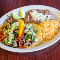 combo tacos rancheros plate · 2 tacos rancheros whith rice and beans