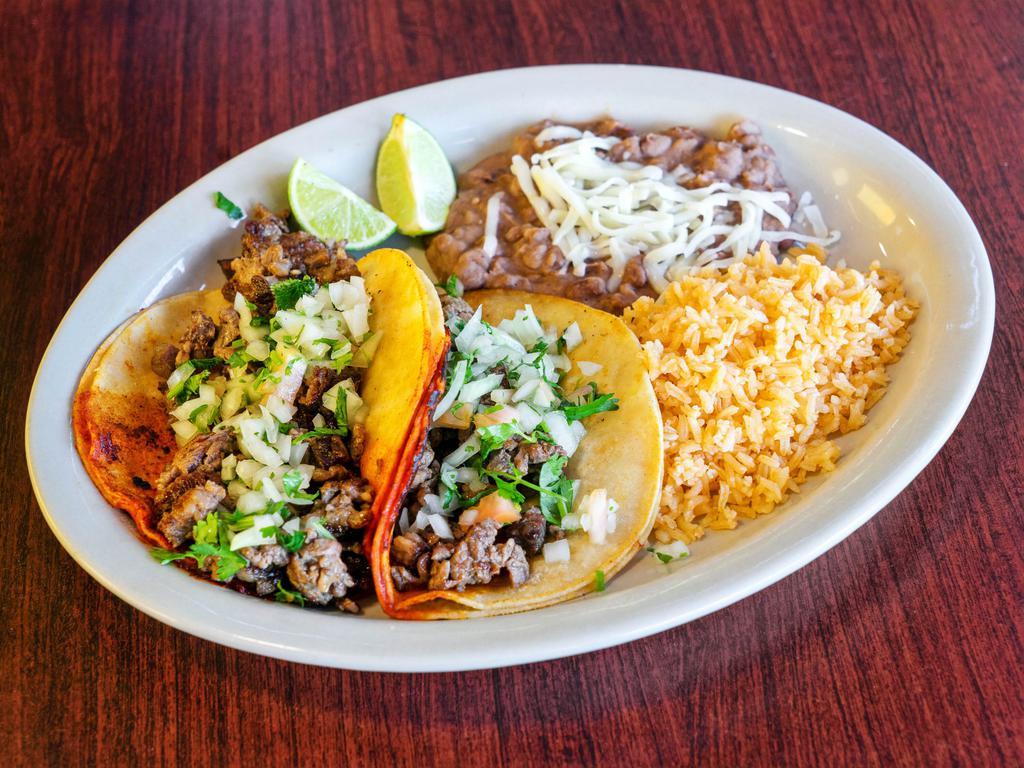 Combo Taco (2) · 2 tacos with choice of meat, served with rice and beans