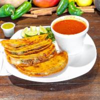 Tacos Quesobirria · 4 tacos servido con consome de 12 oz. 4 tacos served with 12 oz. consome.  If you would like...
