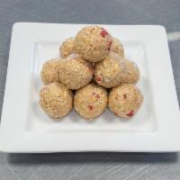 Strawberry B.A.N.A.N.A.S. Ball · Dried bananas, dried strawberries, pea protein, cashews, and agave nectar.