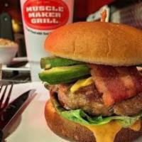 Premium Classic Beef Burger · 665 calories. Comes with turkey bacon, reduced fat cheddar cheese, romaine, tomatoes and oni...