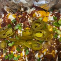 Everything Fries · Cheddar cheese sauce, broccoli, sour cream, scallions, jalapenos, bacon, black olives, marin...