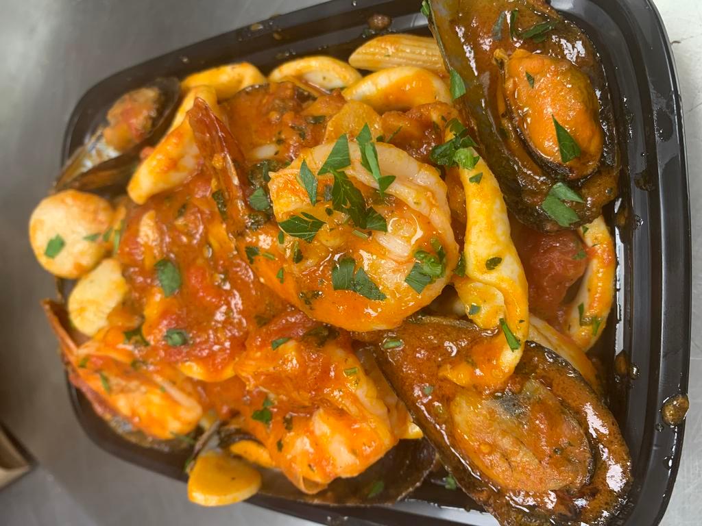 Seafood Marechiara · Shrimp, scallops, mussels and calamari in our special marinara.