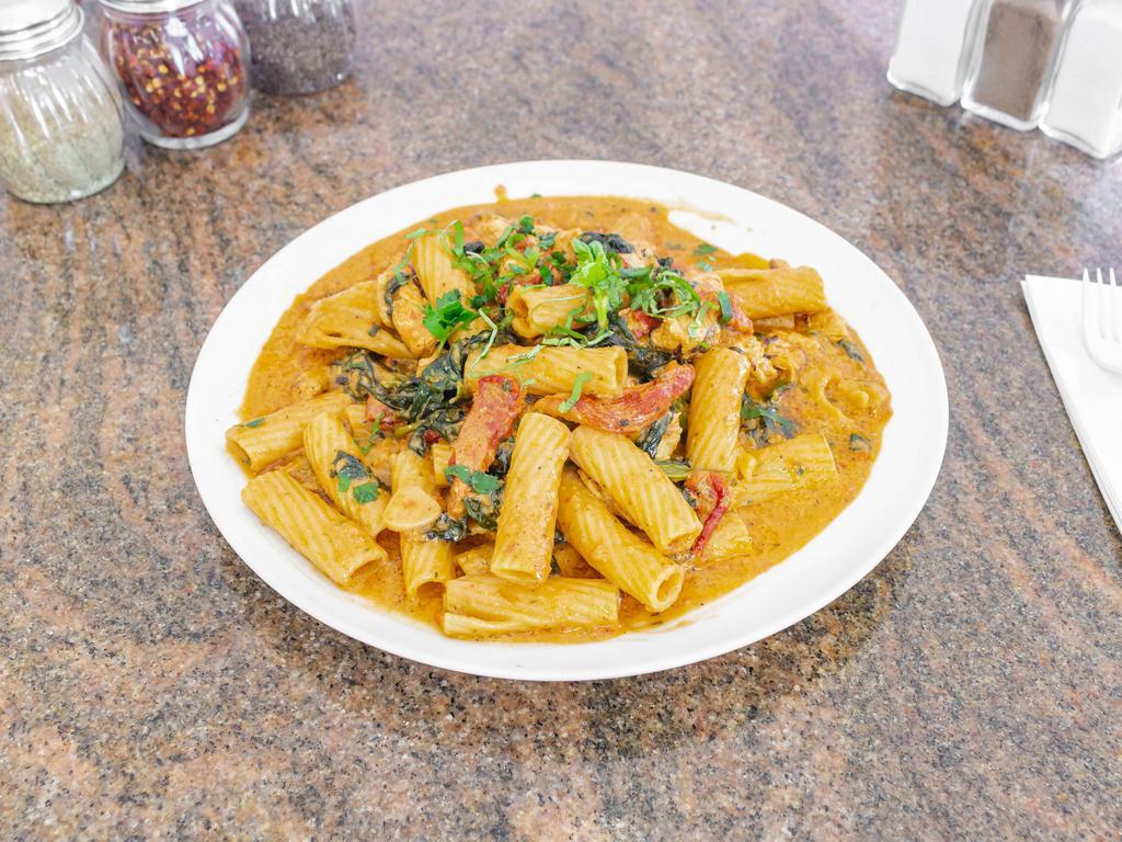 Rigatoni Leo · Grilled chicken, spinach and sun-dried tomatoes in an ala pink vodka sauce.