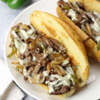 Cheesesteak Hero · Pepper, onion and mozzarella. Add mushrooms, garlic bread for an additional charge.