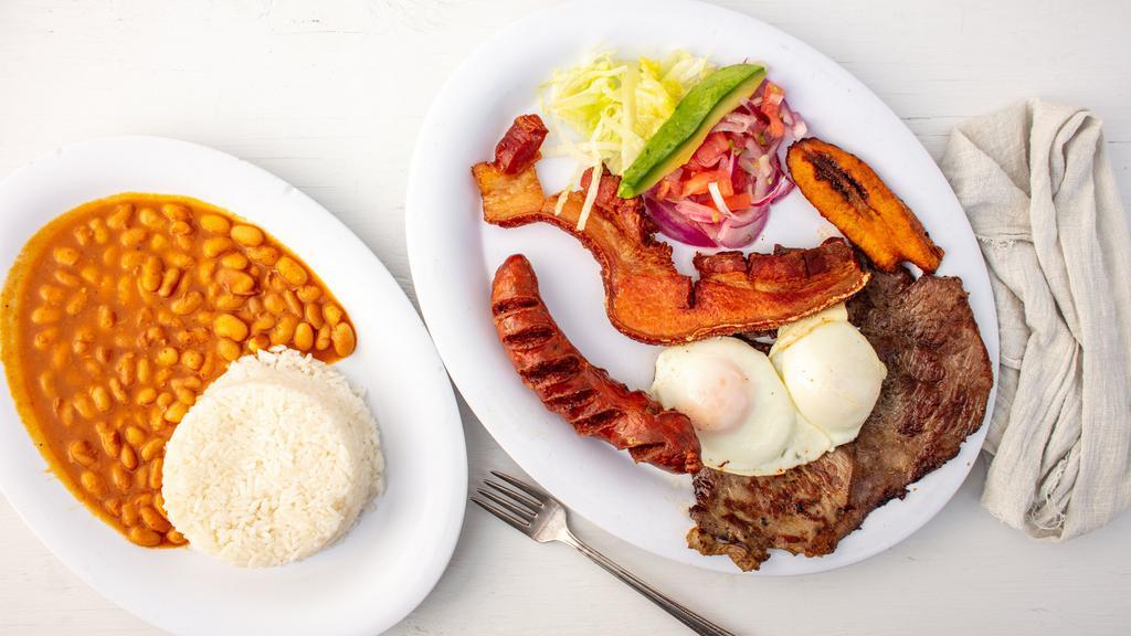 Bandeja Montanera  · Mix platter with grilled beef, skin pork, fried egg. Served with rice, beans, avocado and plantain.
